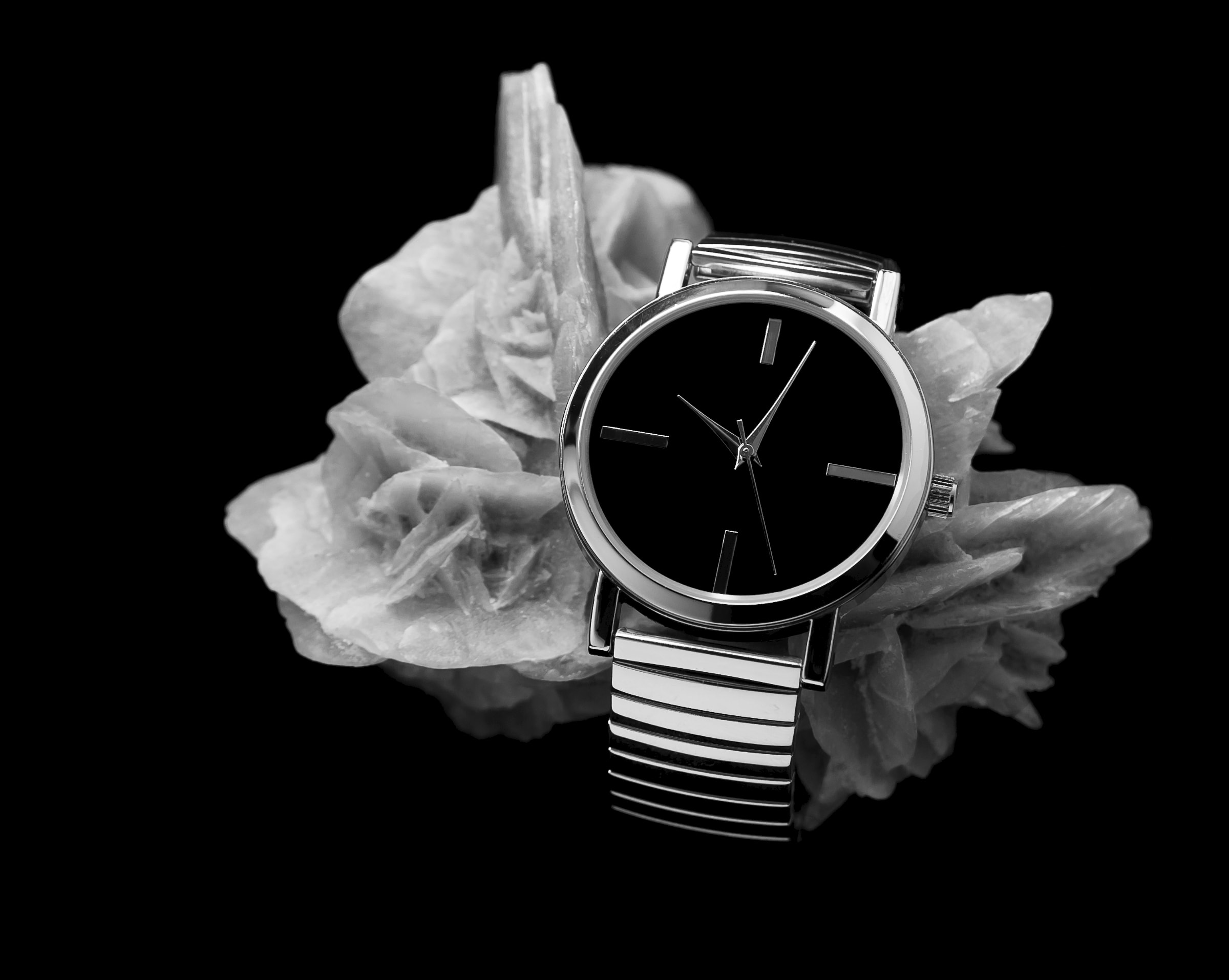 Elegant wristwatch resting on a rock-like formation for the Richfields project
